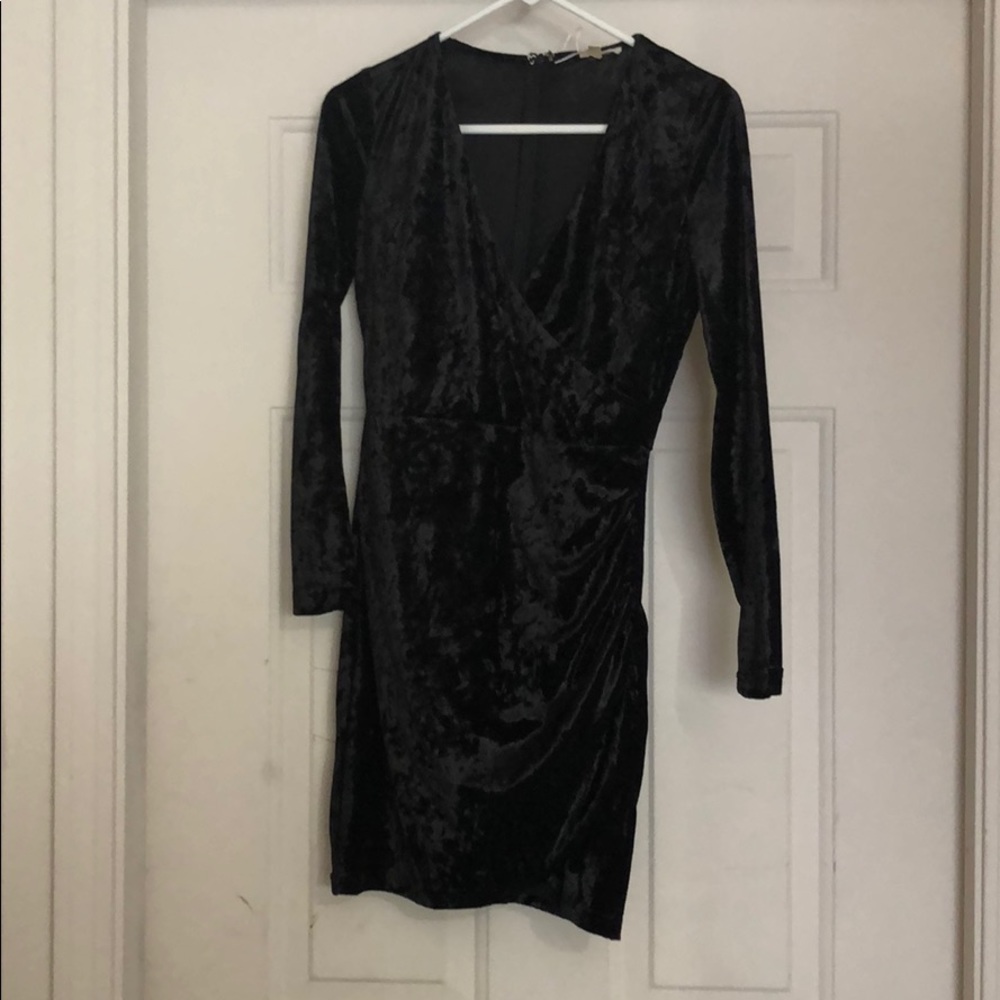 Black long sleeved velvet dress